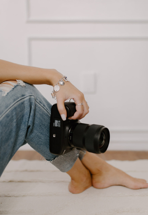 Photographer working with a client at the studio